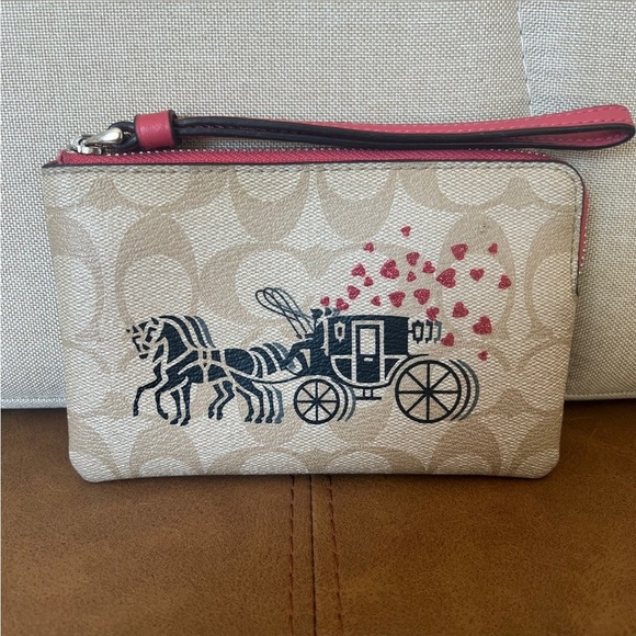 COACH Corner Zip Wristlet In Signature Canvas With Horse & Carriage Hearts Motif - Picture 3 of 15